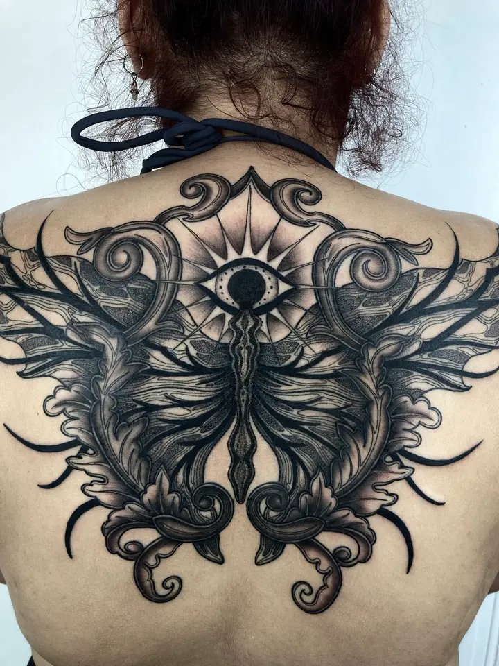 Eye Butterfly Back — Blackwork tattoo by Nillattt, photo 1