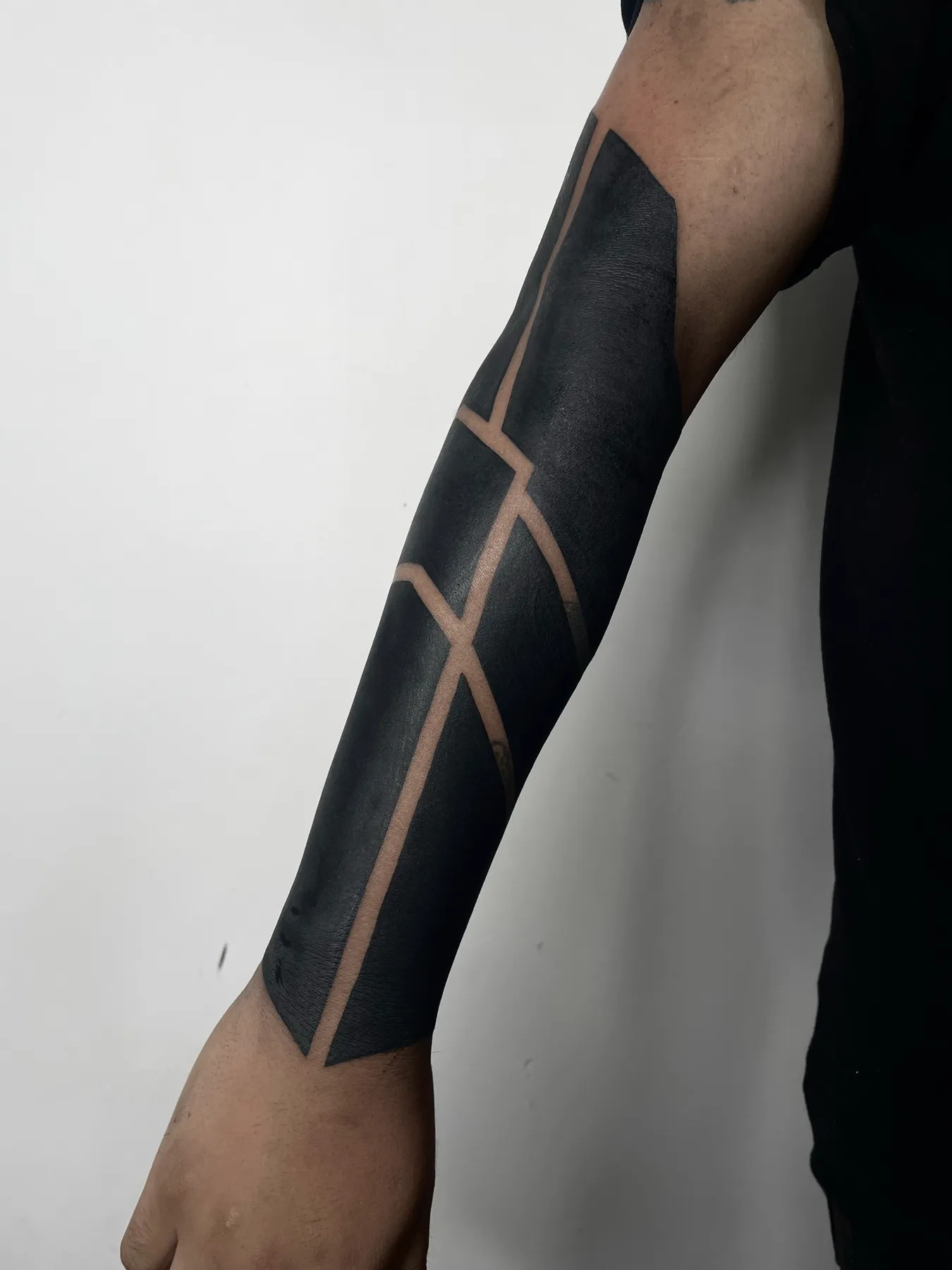 Geometric Forearm — Blackout tattoo by Nillattt, photo 1