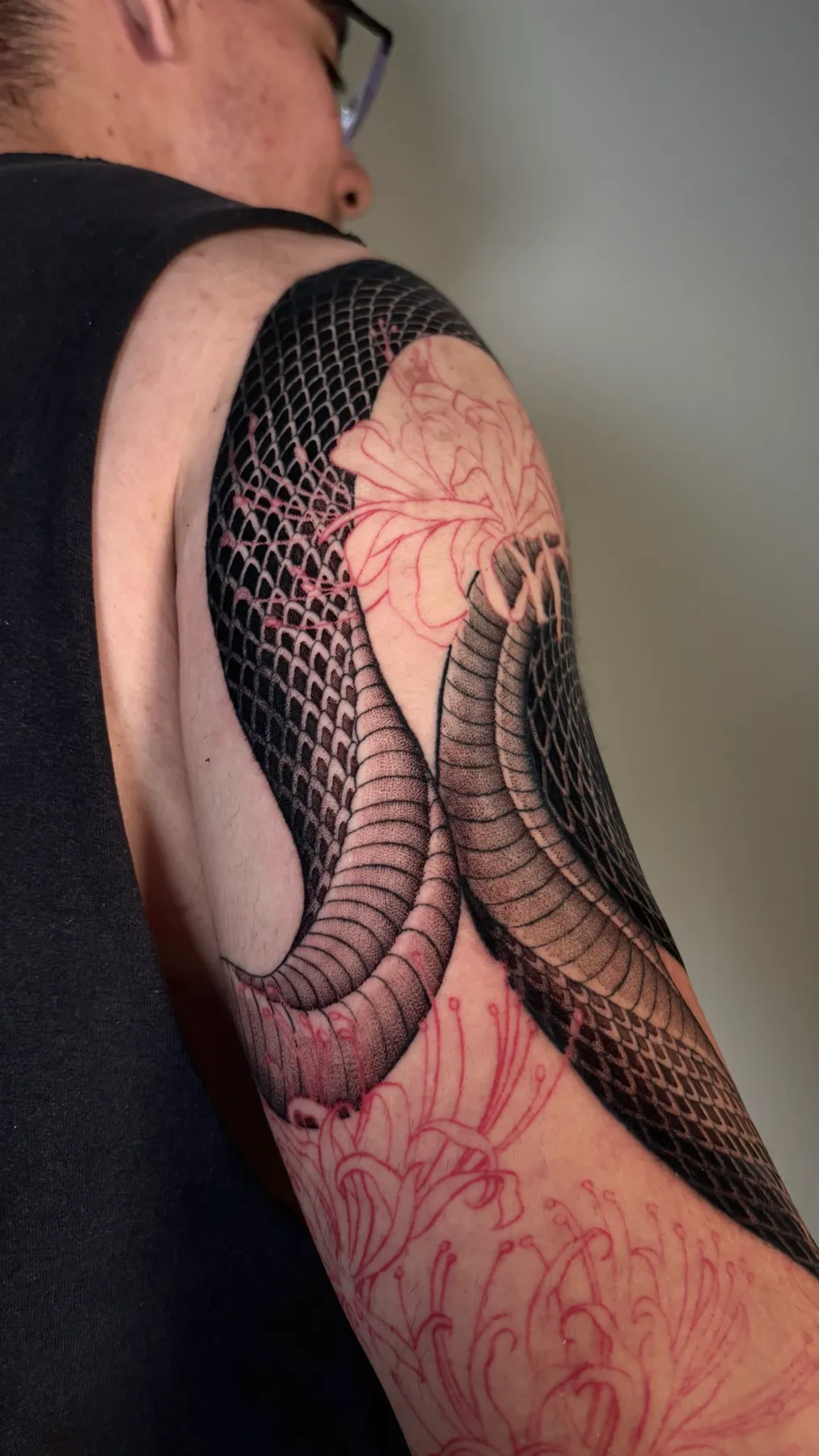 Serpent & Blossoms — Blackwork tattoo by Nillattt, photo 1